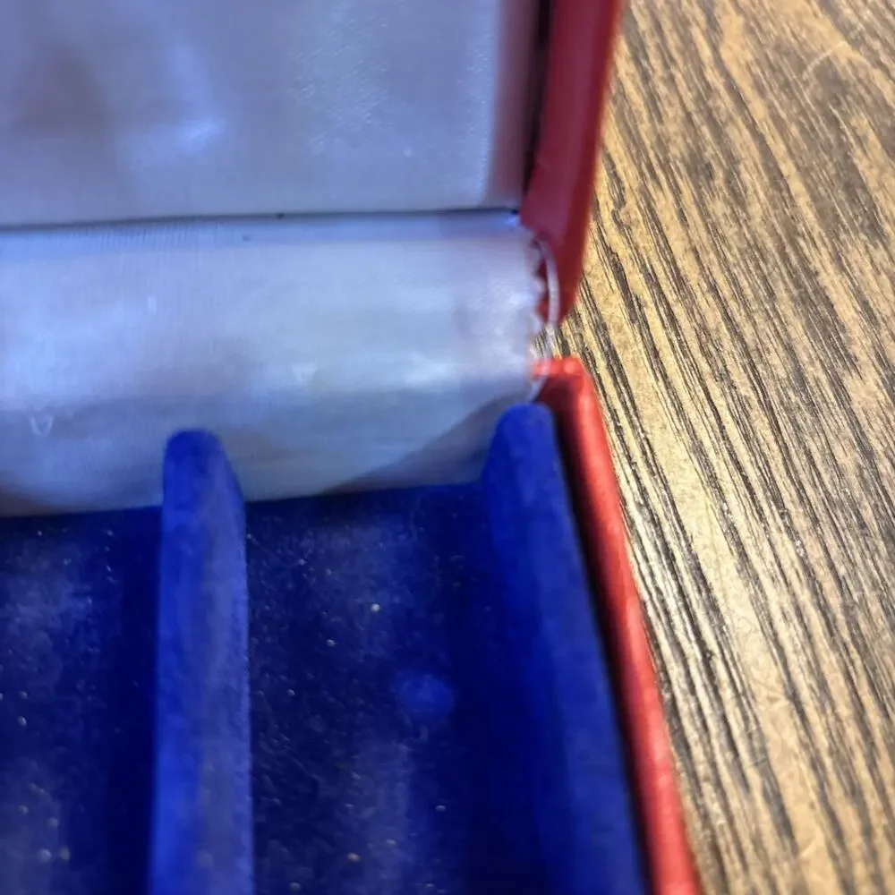 4 Salt and Pepper Shakers in Original Box pre owned silver colored